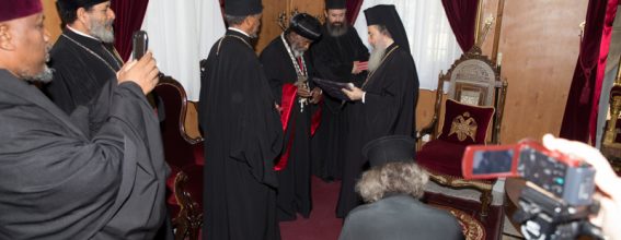 His Beatitude and the Ethiopian Archbishop exchanging gifts
