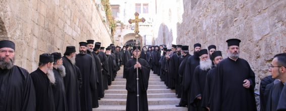 Members of the Holy Sepulchre descend to the All-Holy Church of the Resurrection