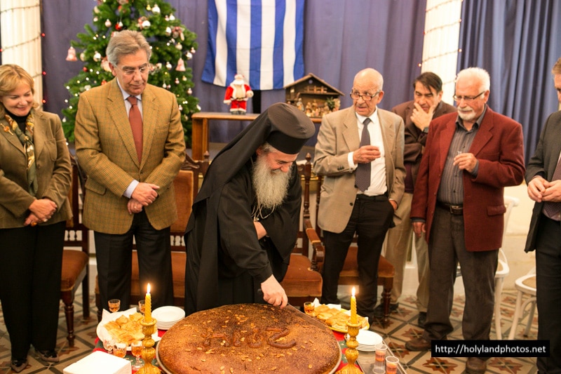 His Beatitude cuts St Basil’s pie at the Greek Club