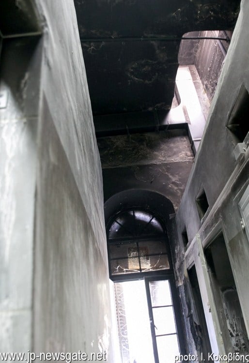 The window through which the burning material was deposited