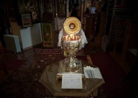 His Beatitude offers a piece of cake to the Metropolitan of Helenoupolis