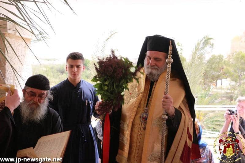 The Most Rev. Metropolitan Isychios of Kapitolias at the bank of the river Jordan