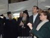 Doamna Moropoulou explicând domnului Tsipras lucrările la pereții Ediculei