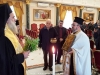 ÎPS Arhiepiscop de Sevastia binecuvântând de la Catedrala Sfântului Iacob înspre Sala de recepție a Patriarhiei