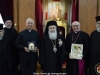 Fotografie comemorativă cu noul delegat apostolic și părinți aghiotafiți