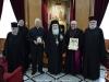 Fotografie comemorativă cu noul delegat apostolic și părinți aghiotafiți
