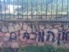 شعارات ضد المسيحية على جدران دير الصليب المكرم
